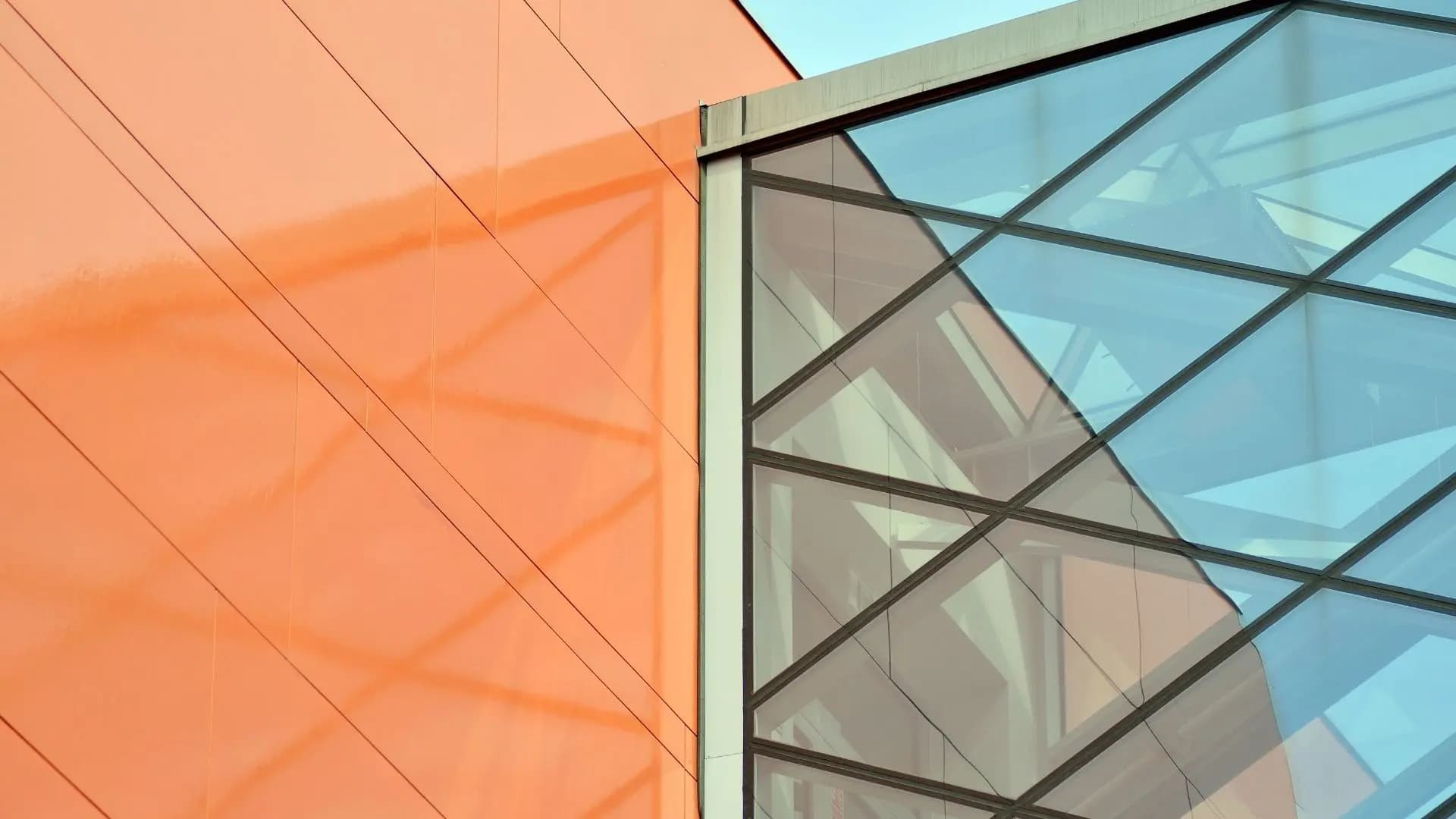 Processed architectural glass facade edges and geometry
